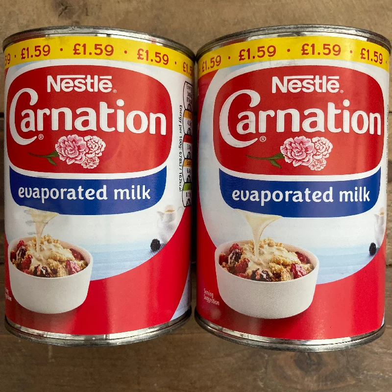 - ​​Christmas pet Christmas clothing2x Nestle Carnation Evaporated Milk Tins (2x410g)