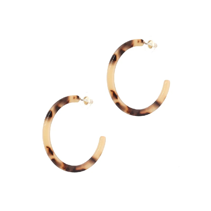 - Foldable and portable cat bagTortoise Hoop Earrings